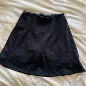 XS black mini skort.